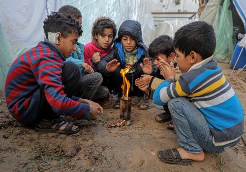 (231215) -- BEIJING. 15, 2023 (Xinhua) -- Palestinian children are seen at a temporary shelter in the southern Gaza Strip city of Khan Younis, Dec. 13, 2023. According to the United Nations (UN), approximately 1.9 million people in Gaza, or 85 percent of its population, have been internally displaced, some of whom have been displaced for multiple times. (Photo by Rizek Abdeljawad/Xinhua)